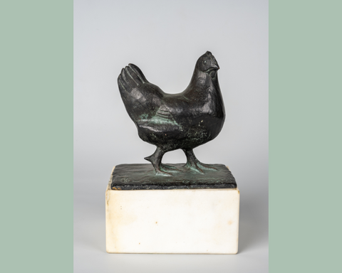 Bronze représentant une petite poule